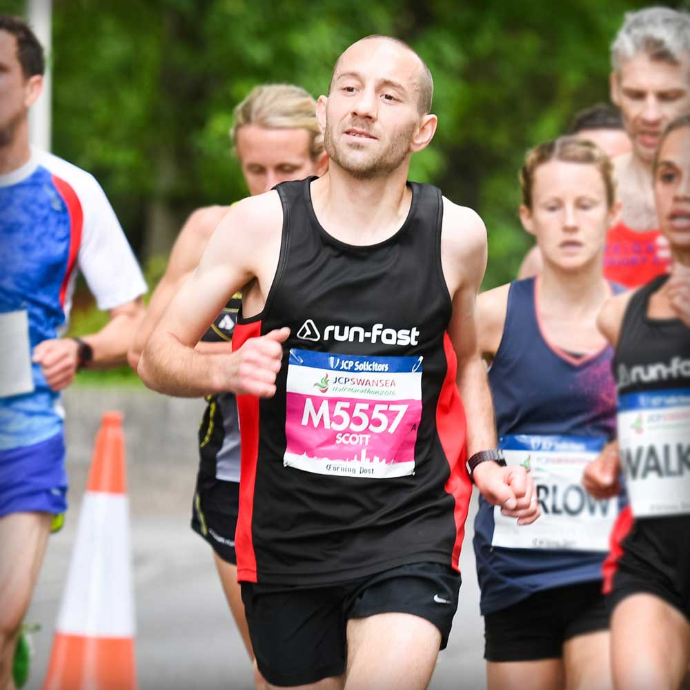 Physiotherapist Scott Newton running the Swansea Half Marathon